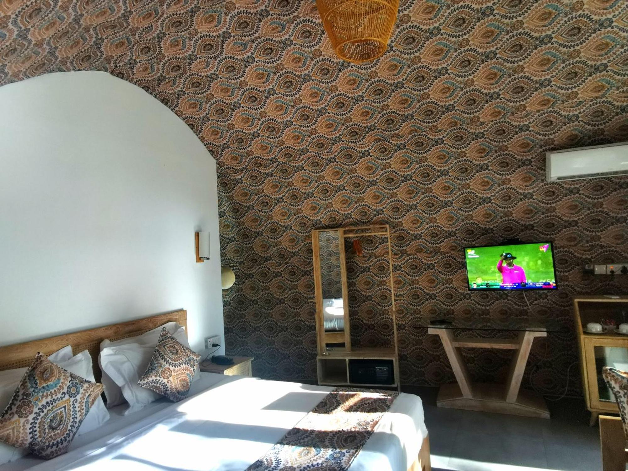Nivadoo Resort Szigirija Kültér fotó A room at the hotel